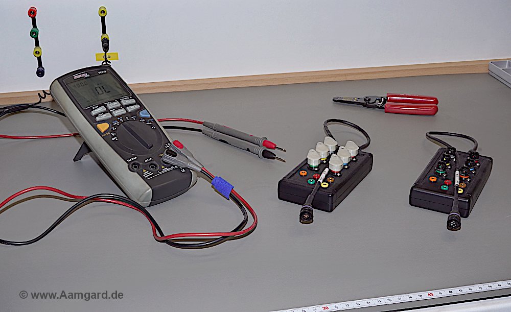 Aamgard breakout box and voltage gauge at the lab desk